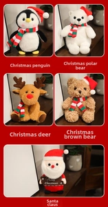 Vista dettagliata di peluche Babbo Natale, pinguino, alce e orso con sciarpe festive