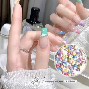 Colorful resin heart nail art charms in macaron candy tones for DIY manicure decoration