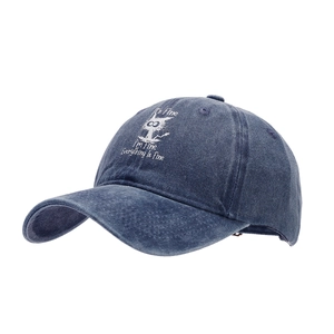 Distressed navy blue washed cotton baseball cap with white cat print and funny quote