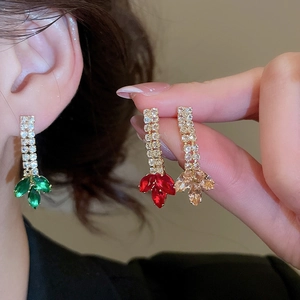 Detail of elegant zircon wheat tassel earrings featuring green, red, and champagne stones