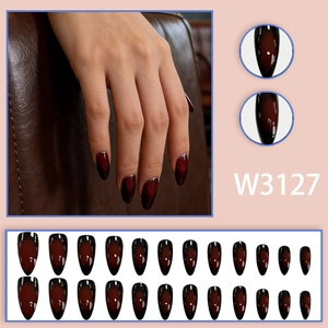 Press-on nail set with dark red to black cat-eye gradient design in almond shape