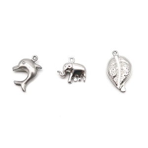 DIY stainless steel charms in silver dolphin, elephant, and hollow leaf shapes