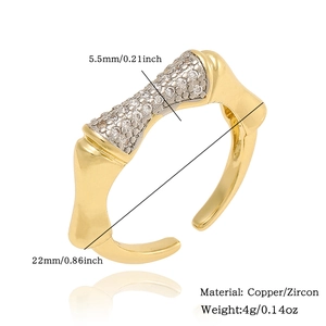 Detail view of gold floral ring showing dimensions 5.5mm width and copper zircon material