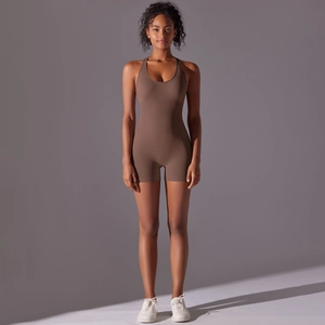 Detail of coffee brown seamless yoga jumpsuit with U-neck and backless design