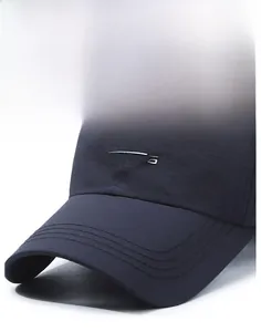 Close-up of R SPORTS baseball cap featuring a reinforced brim and textured breathable fabric