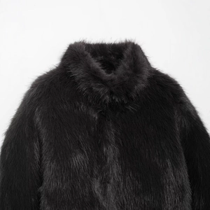 Women's black faux fur jacket with stylish stand collar and plush textured finish