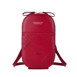 Red leather crossbody phone bag detail view with cute bear embroidery and stylish bow decoration.