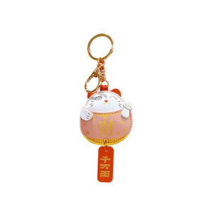 Pink PU leather Maneki Neko keychain with golden alloy ring and lucky fortune charms