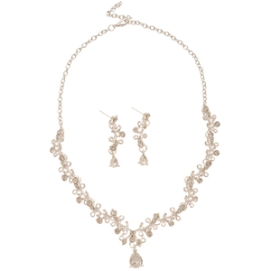 Silver flower jewelry set with sparkling rhinestones and teardrop pendants on white base
