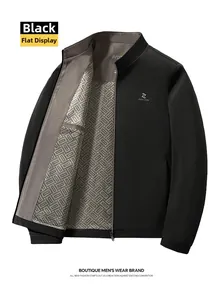 Detailed interior of black stand-collar jacket with geometric jacquard lining and logo
