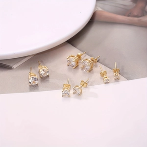 Classic S925 silver stud earring set with four sizes of gold-plated round cubic zirconia