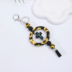 Silicone sunflower car pendant featuring a black cross with Jesus lettering and tassel