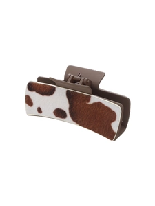 Elegant cow print hair claw clip with dark brown matte finish and faux fur texture