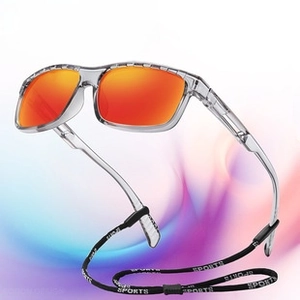 Detail of polarized cycling sunglasses with orange mirrored lenses and sports lanyard