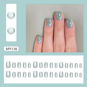 Elegant emerald green cat eye press-on nails with 24 pieces in a short square shape