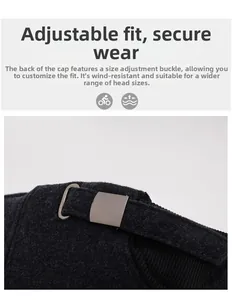 Detailed macro view of the adjustable metal buckle on a gray wool winter baseball cap