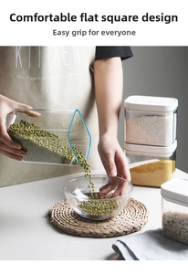 Detail showing the ergonomic easy-grip plastic food container pouring mung beans