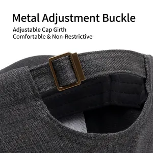 Rear view of grey cotton baseball cap showing adjustable bronze metal buckle and twill fabric