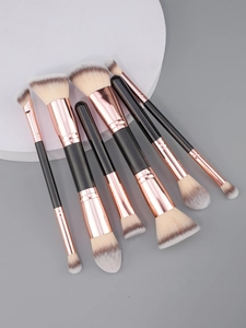 Detail of 6-piece professional dual-ended makeup brush set with rose gold metal ferrules