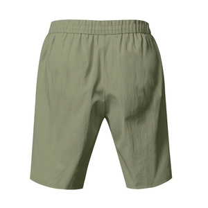 Detailed back view of olive green casual linen shorts with an elastic waistband and texture