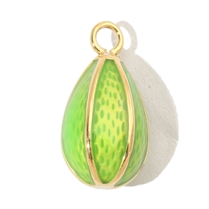 Macro detail of tear-shaped green enamel pendant with polished gold trim and top ring