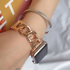 Rose gold chain watch band detail on wrist for a stylish urban lifestyle look