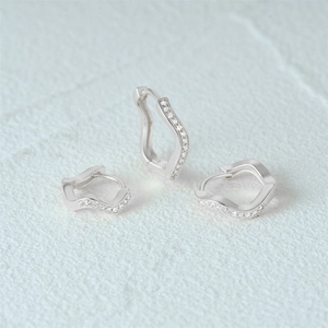 Close-up of S925 sterling silver earring set featuring small zircon stone inlay