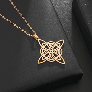 Nordic Celtic knot titanium steel necklace in gold finish on black display stand