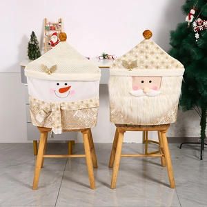 Christmas chair covers featuring Santa and Snowman in white and gold plush fabric