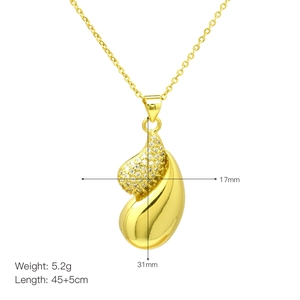 Close-up of gold plated teardrop heart pendant with cubic zirconia and dimension details