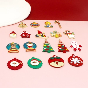 Assorted Christmas enamel charms including Santa, snowmen, and trees for DIY jewelry