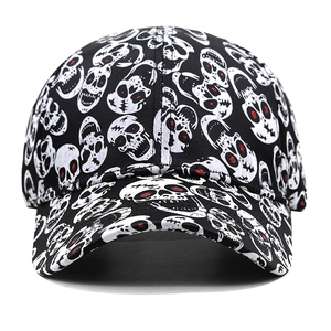 Black baseball cap with white skull prints and red glitter eyes in a classic six-panel style