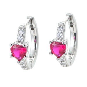 Minimalist silver hoop earrings featuring a heart-shaped magenta gemstone with tiny diamonds