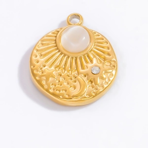 Celestial 18k gold plated pendant featuring embossed sun moon stars and opal stone