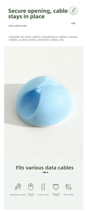 Macro detail of a light blue silicone cable organizer showing circular clip and adhesive base