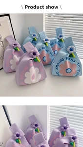 Detailed knit texture of floral wrist bags with 3D flower charms and woven handles