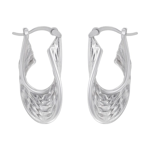 Macro detail of twisted silver hoop earrings with a textured scale pattern and clasp