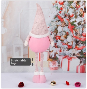 Detail of Christmas gnome with stretchable legs in a festive holiday scene