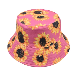 Pink sunflower bucket hat with yellow floral print and reinforced stitching for sun protection