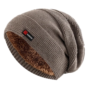 Winter thermal knit beanie with thick fleece lining and decorative fashion label tag