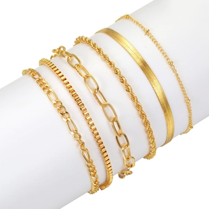 Set of 6 gold layered bracelets featuring cuban, paperclip, and snake chain designs