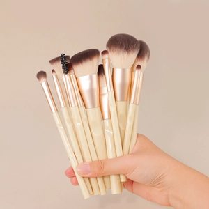 Set di 12 pennelli da trucco professionali con manici beige ergonomici e setole morbide