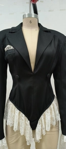 Macro view of long sleeve blazer bodysuit with v-neck and white lace patchwork cuffs