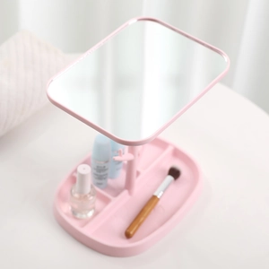 Pink rectangular makeup mirror with storage base and rotating stand for desk organization