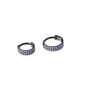 Black stainless steel hinge hoop earrings with triple row zircon stones set in white background