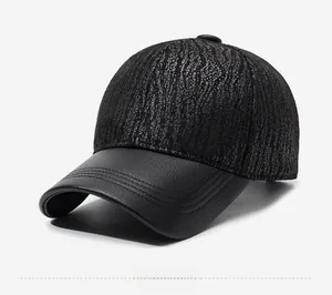 Close-up of black PU leather baseball cap featuring unique bark texture and neat stitching