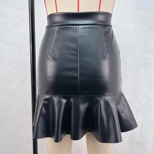 Detailed view of black high-waisted PU leather skirt featuring ruffled fishtail hemline