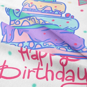 Detailed close-up of soft flannel birthday tapestry with colorful cake and vivid lettering