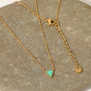 Minimalist gold stainless steel necklace featuring a green triangle opal pendant