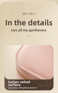 Detail of plush velvet pink jewelry box with fine stitching and golden zipper texture